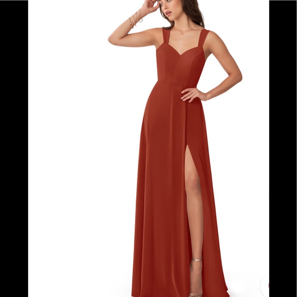 Burnt orange brides maid dress.